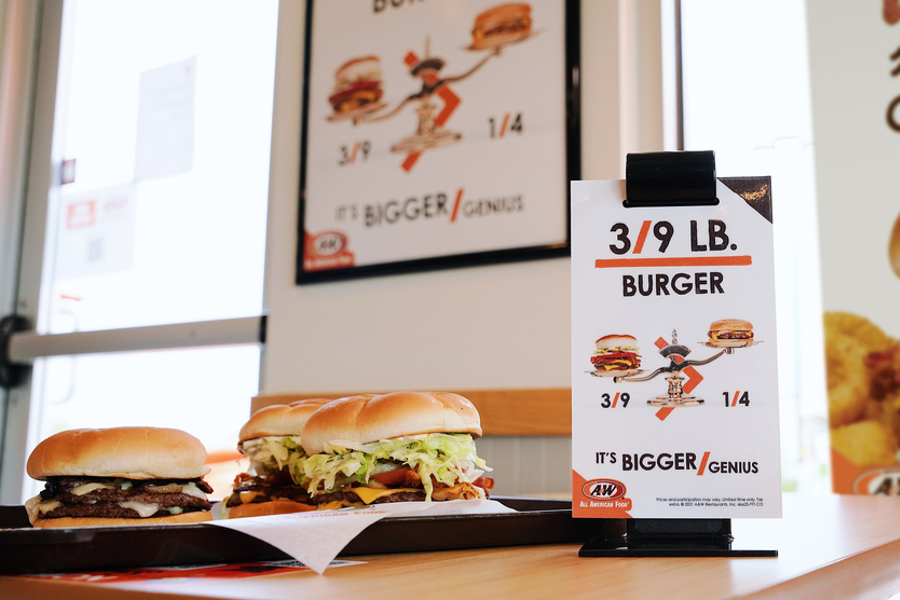 3/9 lb. burger scale from A&W showing 3/9 is larger than 1/4