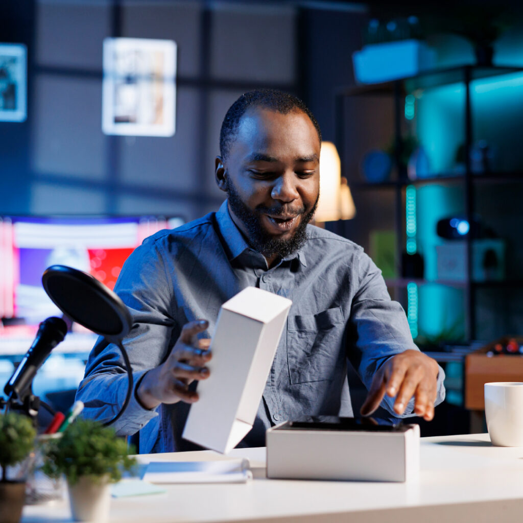 brand loyalty - customer unwrapping a new device